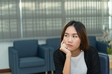 Asian businesswoman stress from hard work,Thai worker woman working in the office,Dark tone