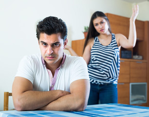 Fototapeta premium Conflict in young family at home.