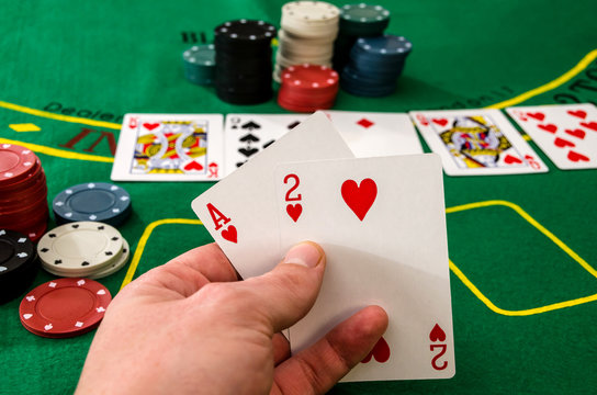 A two-card close-up poker player