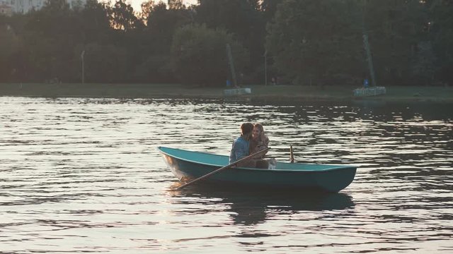 Young couple in a boat outdoors