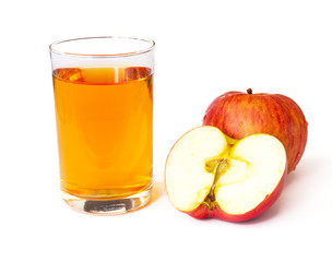 Apple juice in a glass beaker and two fresh sliced apple isolated on a white background