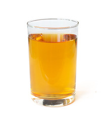 Fresh apple juice in a glass beaker isolated on a white background