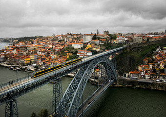 Fototapeta na wymiar Porto. View of the city, the river Duoro and the bridge Ponte Luis 1. Portugal.