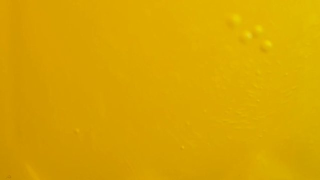 Orange summer drink with bubbles. World of bubbles - Orange. Bubbles of soda closeup. Orange soda and bubbles macro