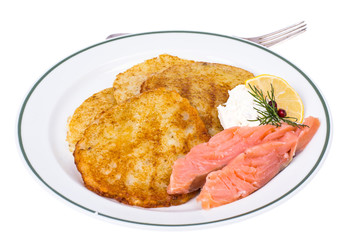 Potato pancakes with smoked salmon and cheese cream