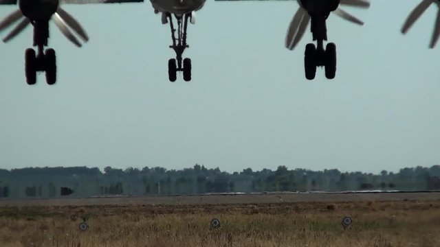 Tu-95 performs landing rear view