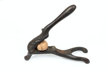 Old metal nutcracker, shape of lion, cast iron, white background, cast iron