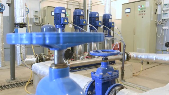 water pump station. Valve faucet and pumps