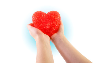 Fototapeta premium Two hands holding an outstretched heart in openness and love