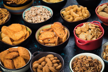 Salty snacks served in bowls