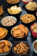 Salty snacks served in bowls
