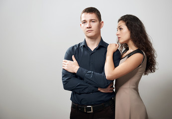 romantic couple posing on white background, love concept