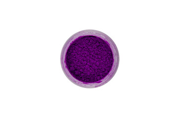 Obraz na płótnie Canvas Purple pigment for manicure. Beautiful bright Purple powder for summer, spring, nail design. Loose paint in a small glass jar on a white background.
