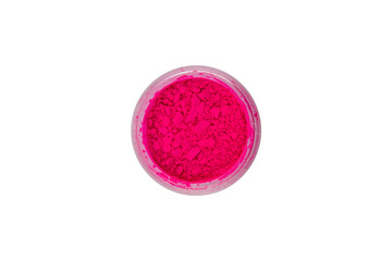 Obraz na płótnie Canvas Fuchsia pigment for manicure. Beautiful bright Fuchsia powder for summer, spring, nail design. Loose paint in a small glass jar on a white background.