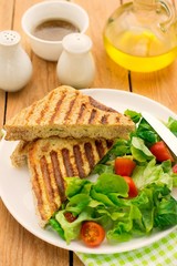 Whole wheat sandwiches stuffed with cheese and parsley
