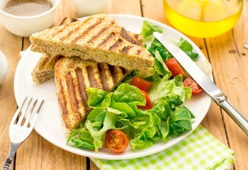 Whole wheat sandwiches stuffed with cheese and parsley