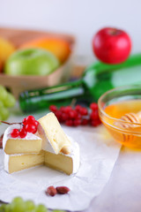 Cheese, camembert, honey, green bottle, red berries, apples, pears, cheese with green grapes, peanuts, pink flower, minimalism, healthy food, French breakfast, pop art, retro style