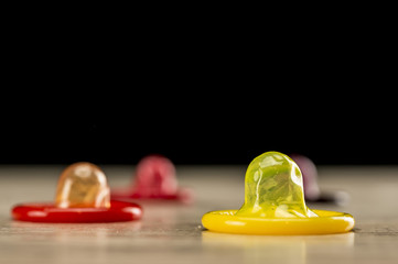 Multi colored condoms