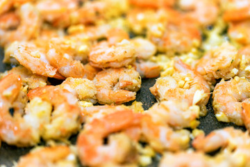 Close-up of shrimps fried in a frying pan