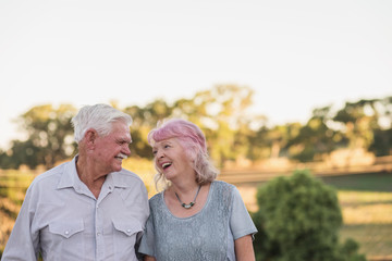 fun senior couple smiling to each other
