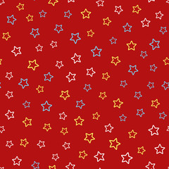 Festive seamless pattern with scattered outlines of stars.
