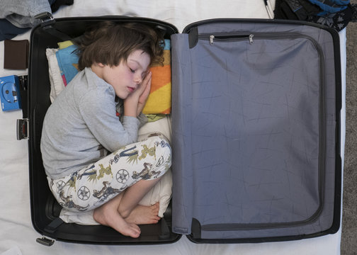 Boy In Suitcase