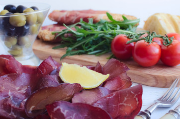 Slices of Bresaola on a plate