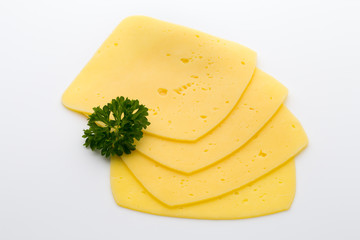 Cheese slices on the white background.