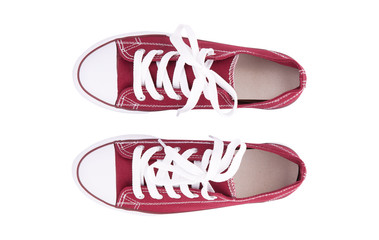 Red sneakers top view isolated on white background