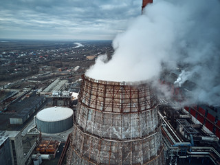 Smoking pipes of thermal power plant. Aerial view. Pipes of thermal power plant. heating of the city. heating season
