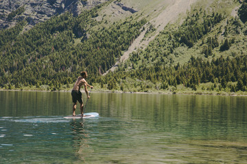 Kids Paddle Boarding in the rockies