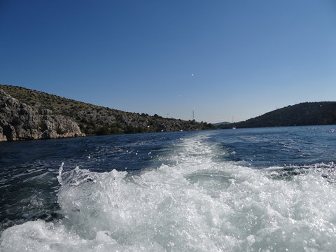 Wake of the luxury motor yacht sailing on the waters of Croatia