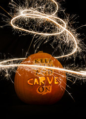Swirling Light Trail around a Halloween Pumpkin
