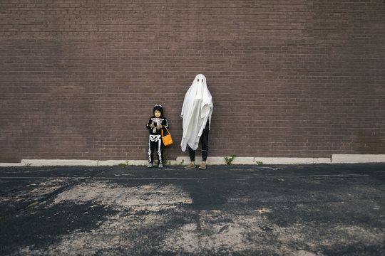 Father and Son Before Trick and Treat on Halloween