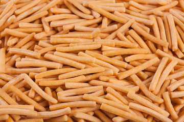 pile of Bread stick or Biscuit stick.