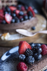 Slice of Chocolate Cheesecake with Berries on Top