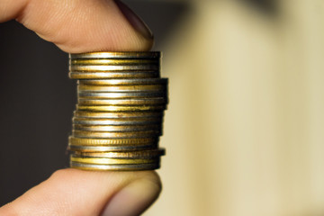 keep a pile of coins in your fingers