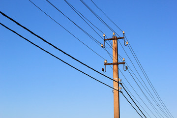 Wires and power line insulators on an electrical pole