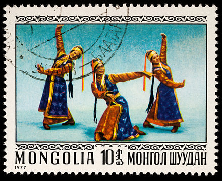Mongolian dancers on postage stamp