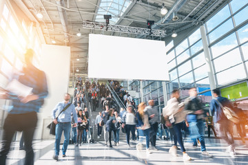 crowd of anonymous blurred people on a airport