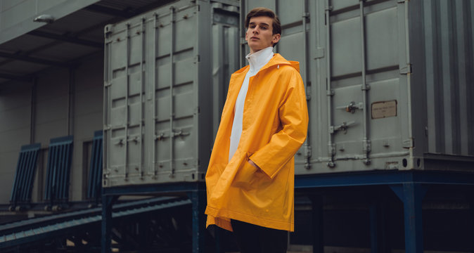 Walk with hip young adolescent/boy at project/soviet era housing blocks.