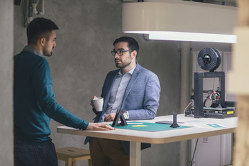 Businessmen Chatting at Work