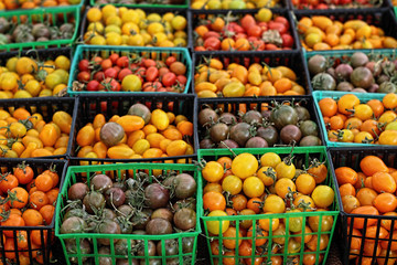 Containers of pear and grape tomoatoes