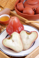 Red rose apple on the plate    
