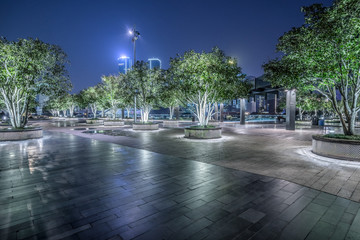 City square and modern architectural scenery at night in Shanghai，China. © hallojulie