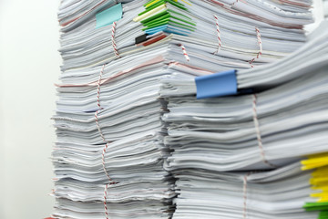 Paperwork pile messy of business financial put on desk