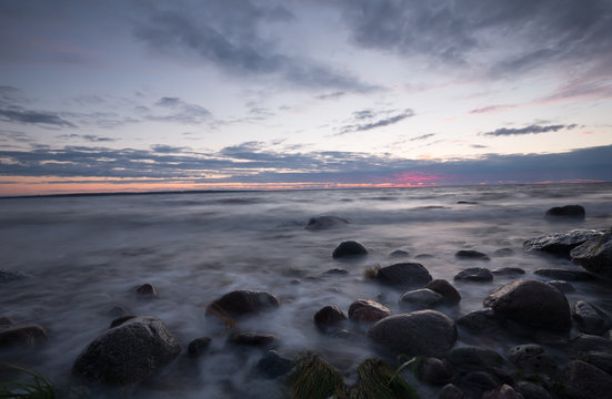 Sunset over a rocky coastline, baltic sea
