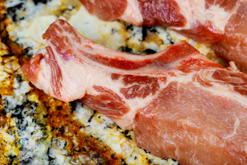 Many fresh pork chops or cutlets