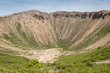 Azuma-Kofuji peak 1707 meters ,Mount Azuma is a roughly 2000 meter tall, volcanic mountain range northeast of Mount Bandai along the border of Fukushima and Yamagata Prefectures