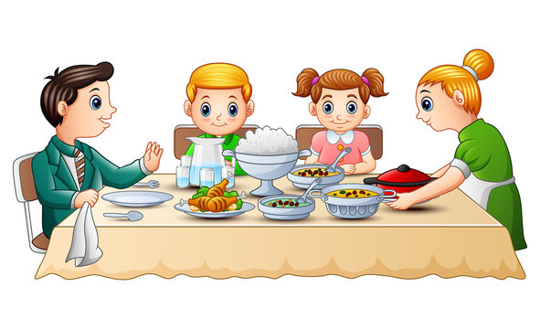Happy family eating dinner together on dining table